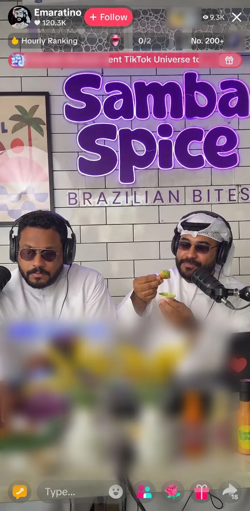 A Twincast TikTok LIVE on the Emaratino account, broadcasting from a restaurant and showing 120.3K likes and 9.3K viewers, one host tasting a dish on air. Viewers' names and comments are blurred.
