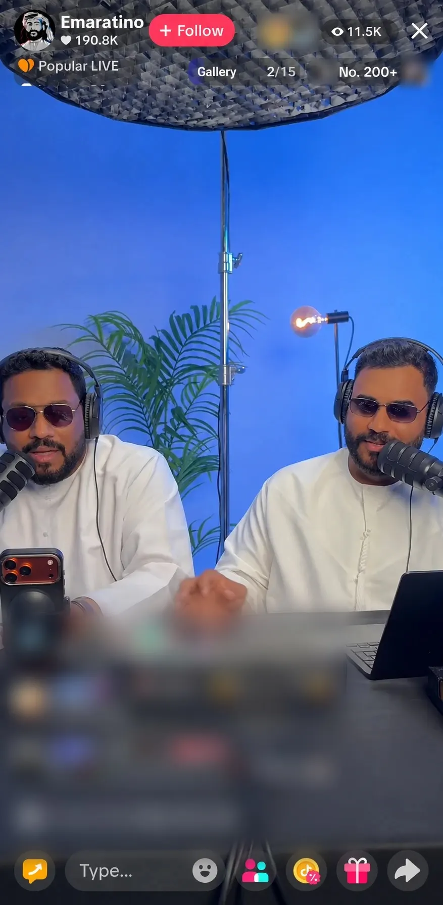 A Twincast TikTok LIVE on the Emaratino account, showing 190.8K likes and 11.5K viewers, with the two hosts at their microphones in front of a blue backdrop. Viewers' names and comments are blurred.